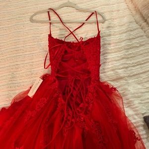 Beautiful red prom dress. Brand new with tags.